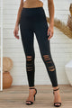 Leggings ajustados desgastados con pretina ancha