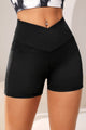 Pantalones cortos activos con cintura ancha y bolsillo
